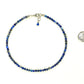 4mm Natural Lapis Lazuli Choker Necklace beside a dime.