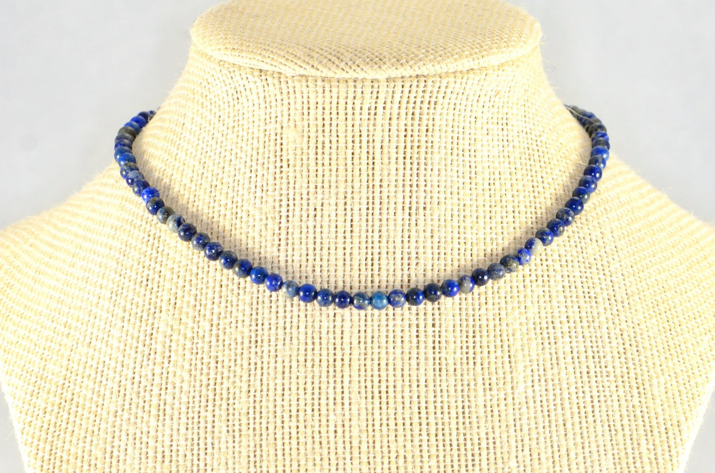 4mm Natural Lapis Lazuli Choker Necklace displayed on a bust.