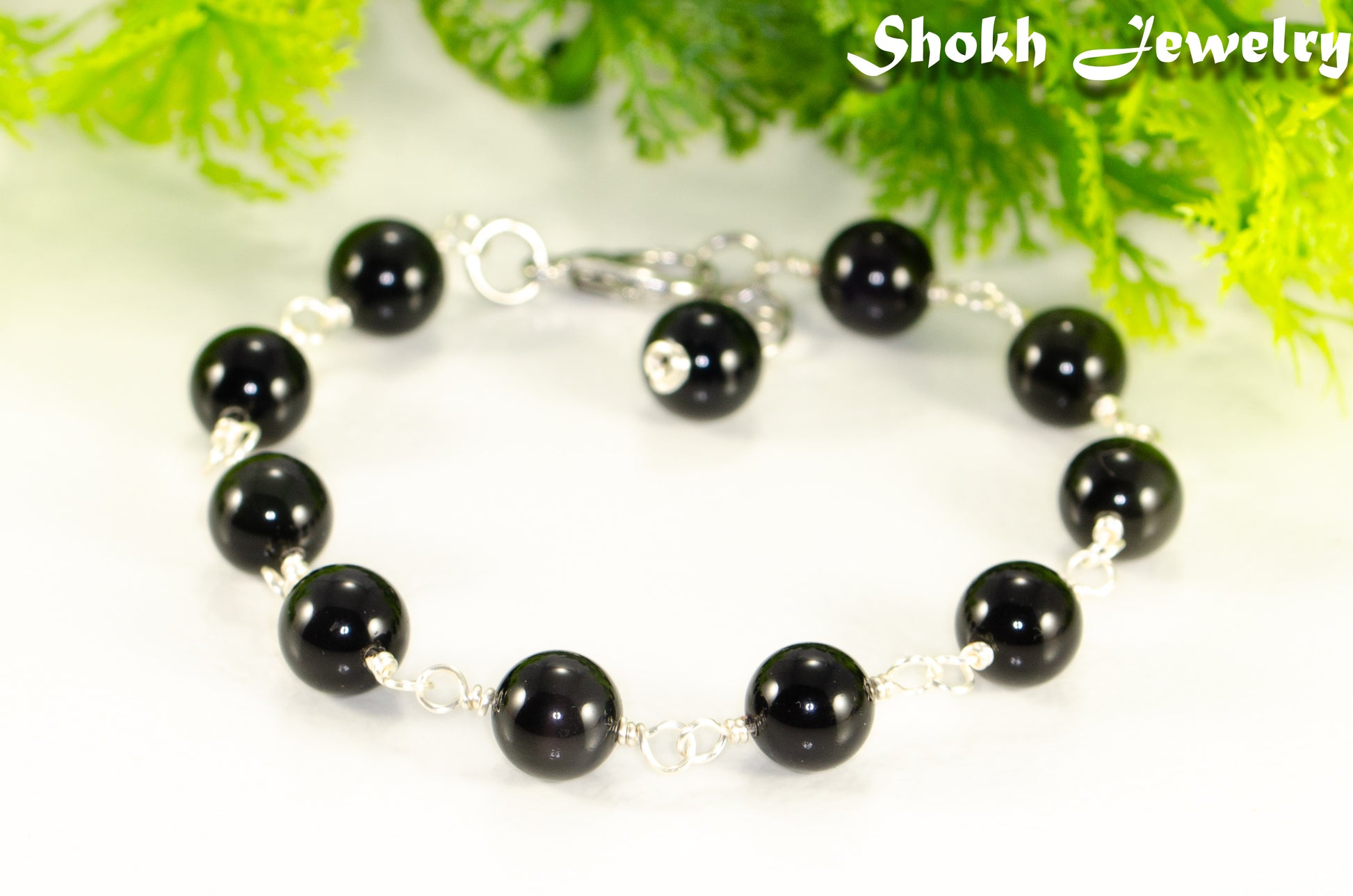 Close up of 8mm Black Obsidian Link Anklet.