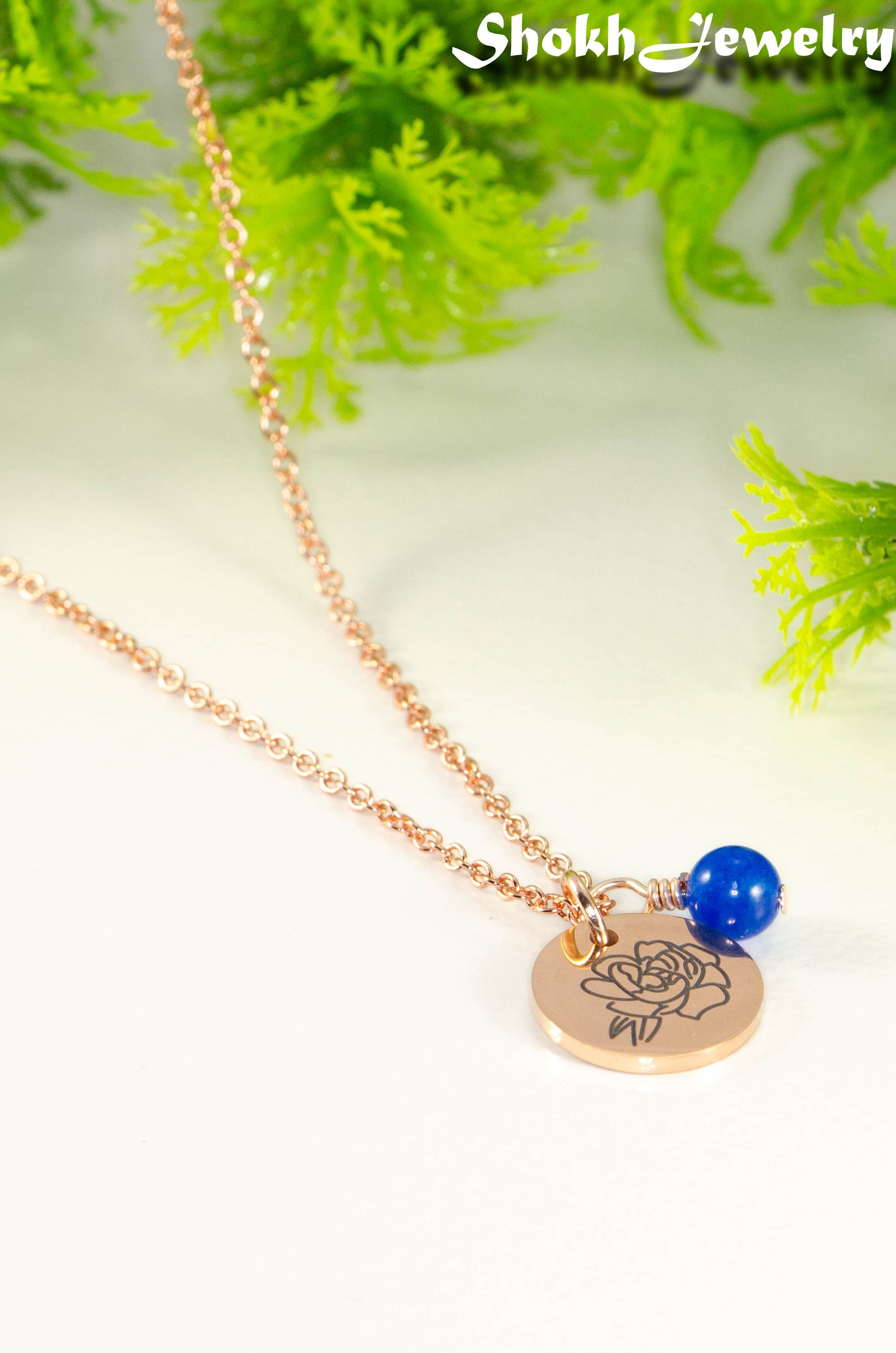 Rose Gold Plated September Birth Flower Necklace with Sapphire Birthstone Pendant.