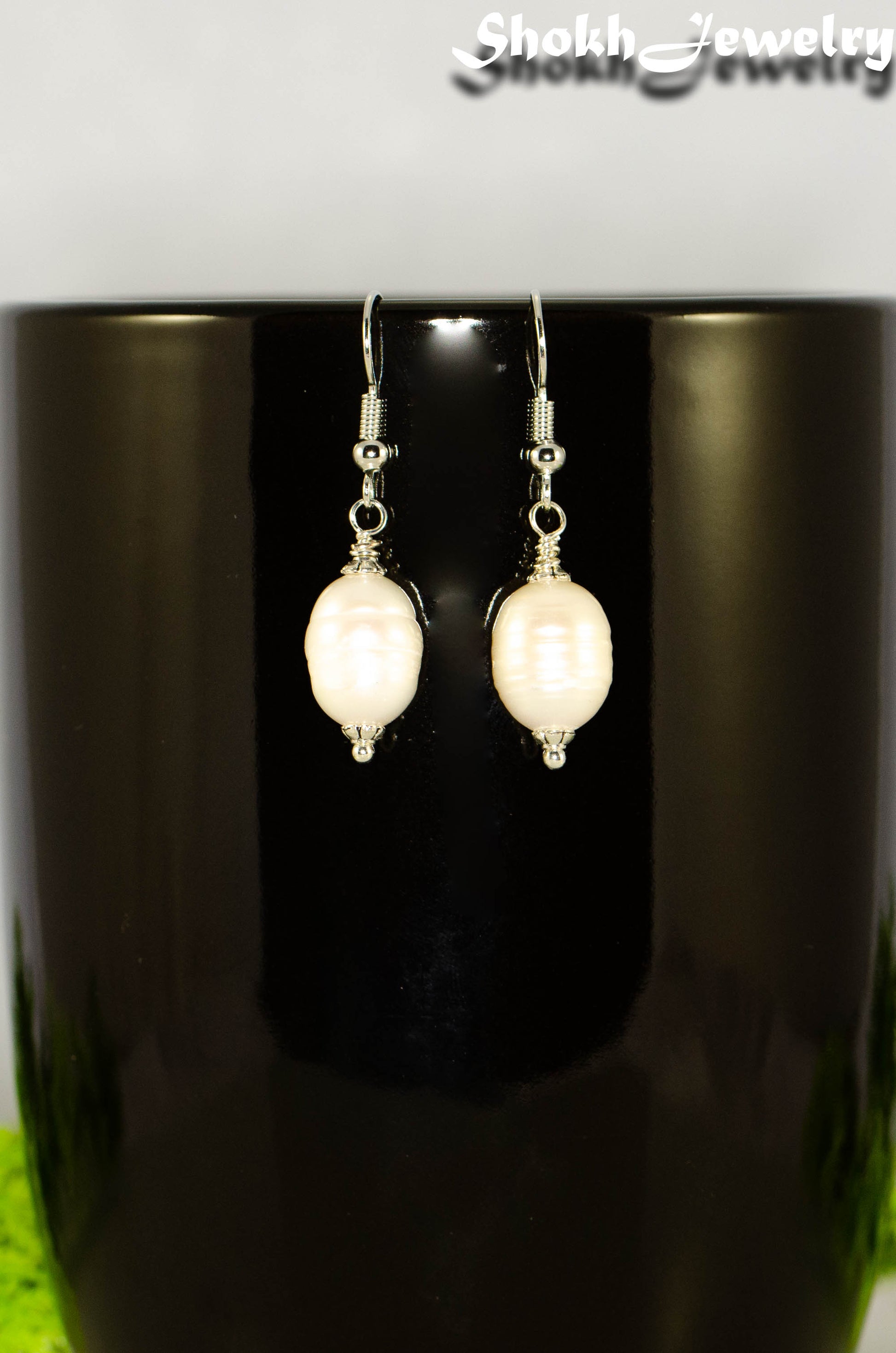 Close up of 12mm Natural Freshwater Pearl Earrings.