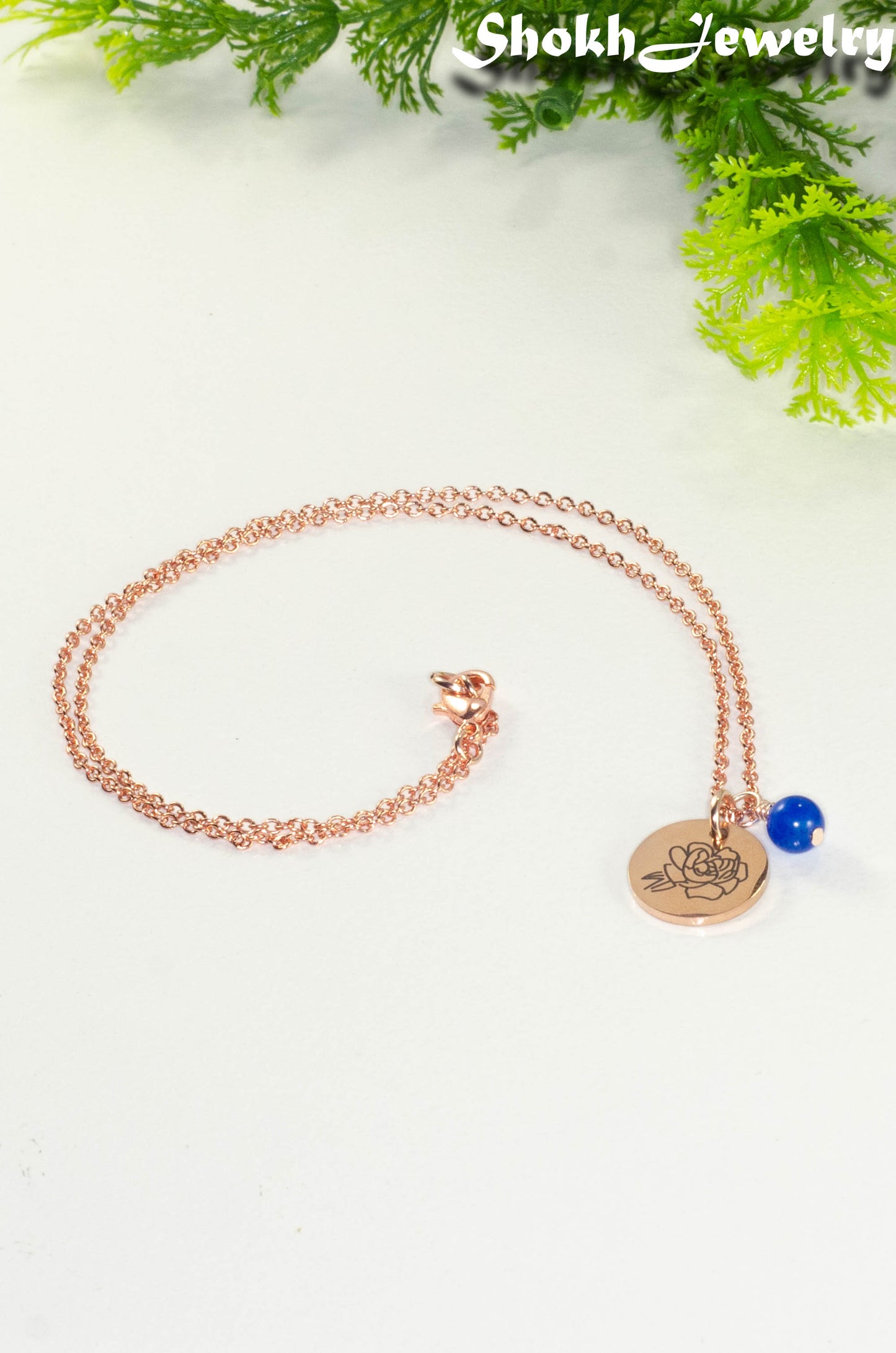 Rose Gold Plated September Birth Flower Necklace with Sapphire Birthstone Pendant.