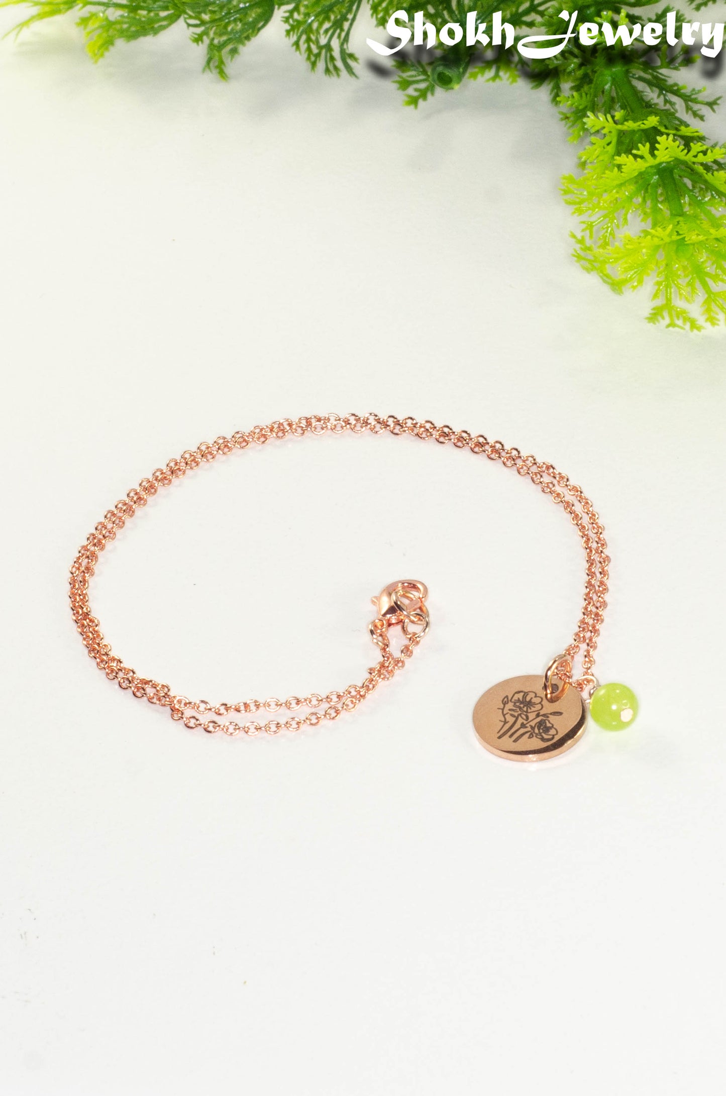 Rose Gold Plated August Birth Flower Necklace with Peridot Birthstone Pendant.