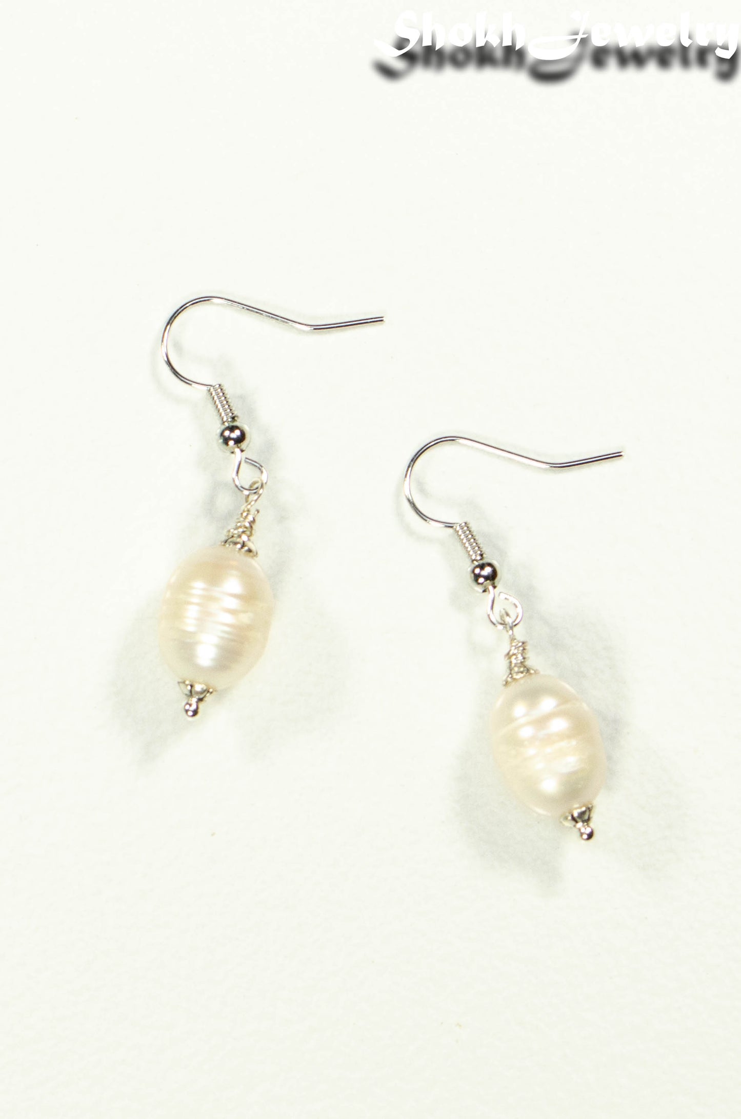 Top view of 12mm Natural Freshwater Pearl Earrings.