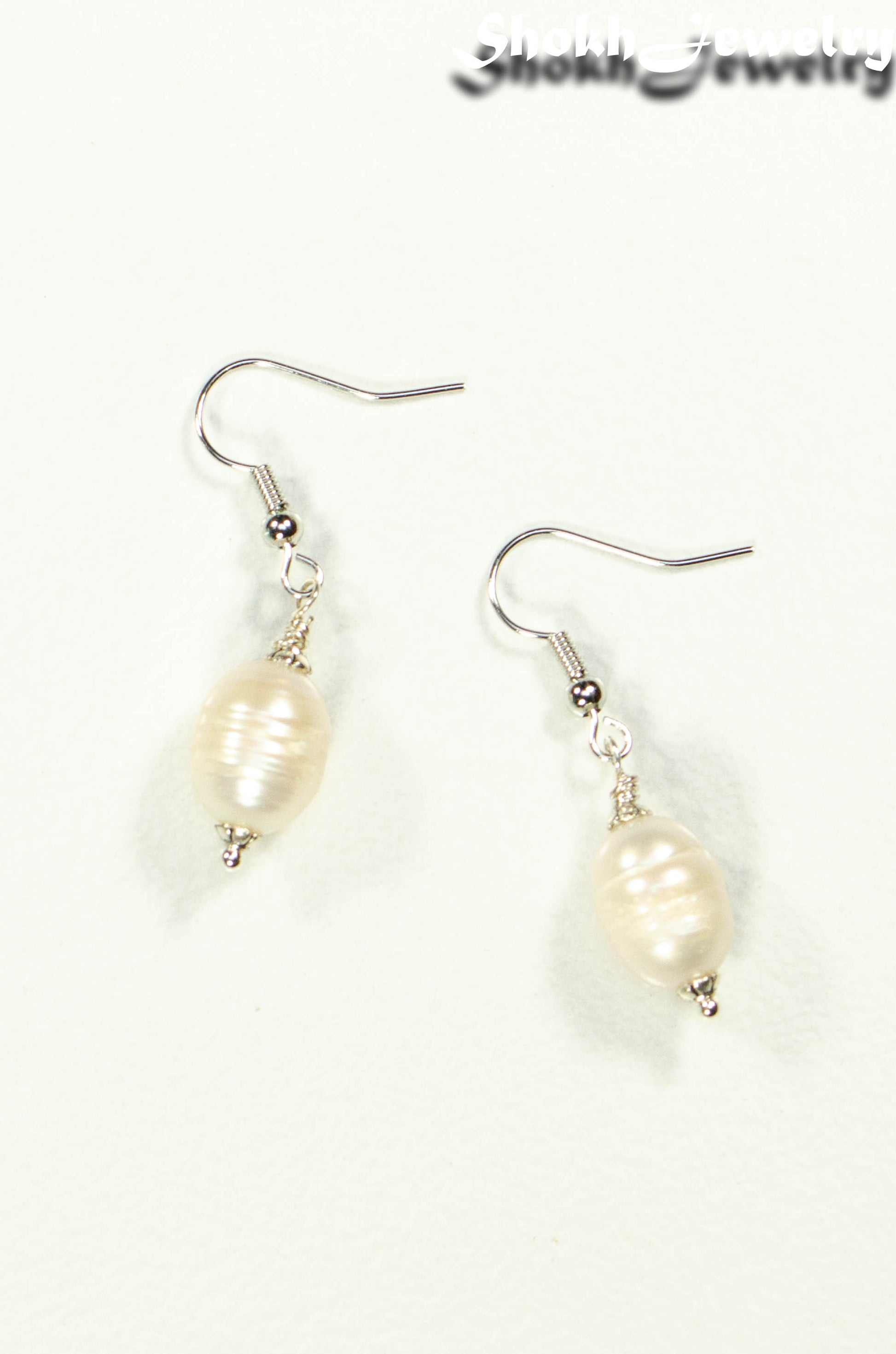 Top view of 12mm Natural Freshwater Pearl Earrings.
