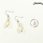 12mm Natural Freshwater Pearl Earrings beside a dime.
