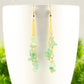 Close up of Long Gold Plated Chain and Green Aventurine Chip Earrings.