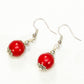 Top view of 12mm Red Howlite Dangle Earrings.
