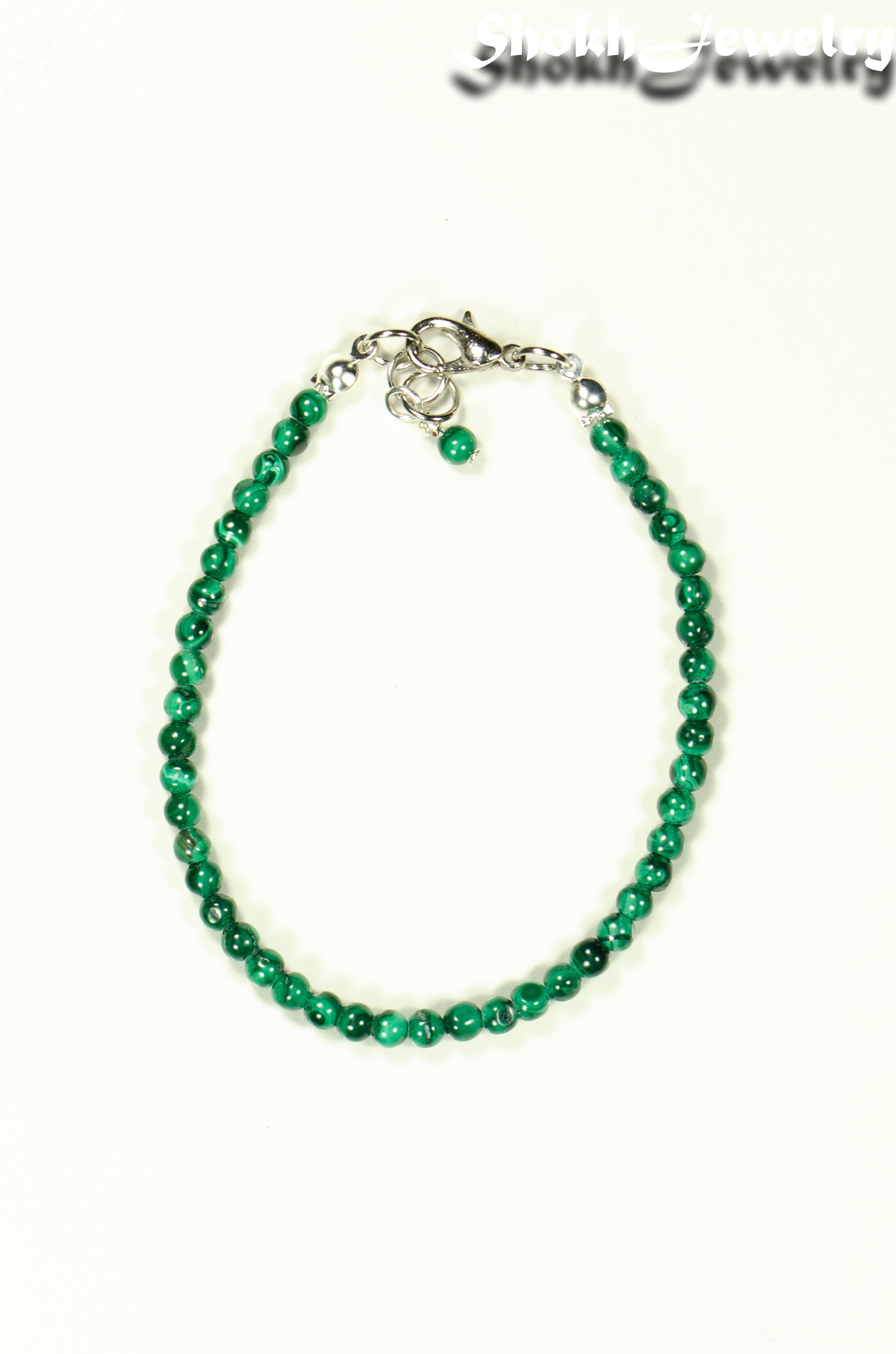 Top view of 3mm Natural Malachite Bracelet with Clasp.
