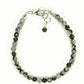 Top view of 4mm Snowflake Obsidian Stone Bracelet with Clasp.