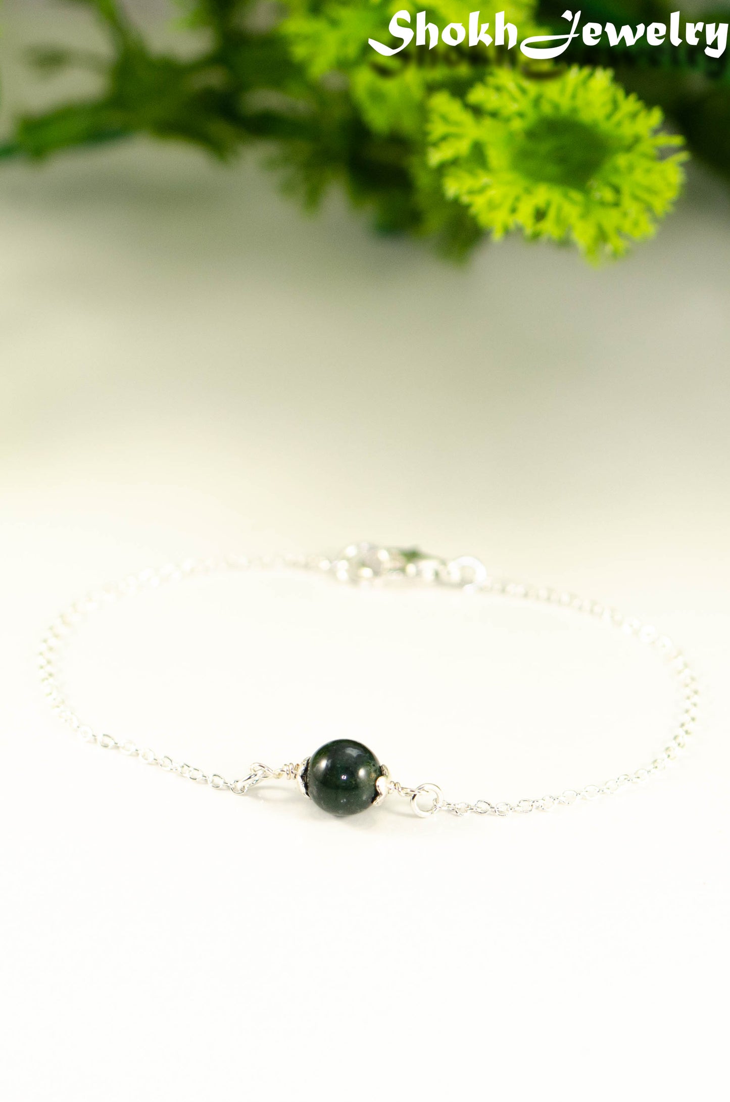 Close up of Minimal Moss Agate Bracelet.