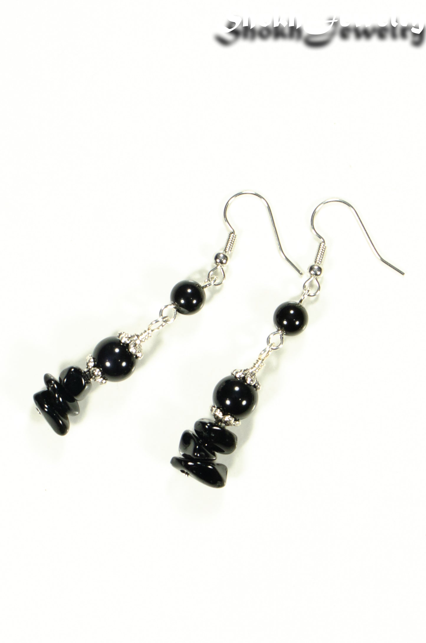 Top view of Long Black Obsidian Crystal Chip Earrings.