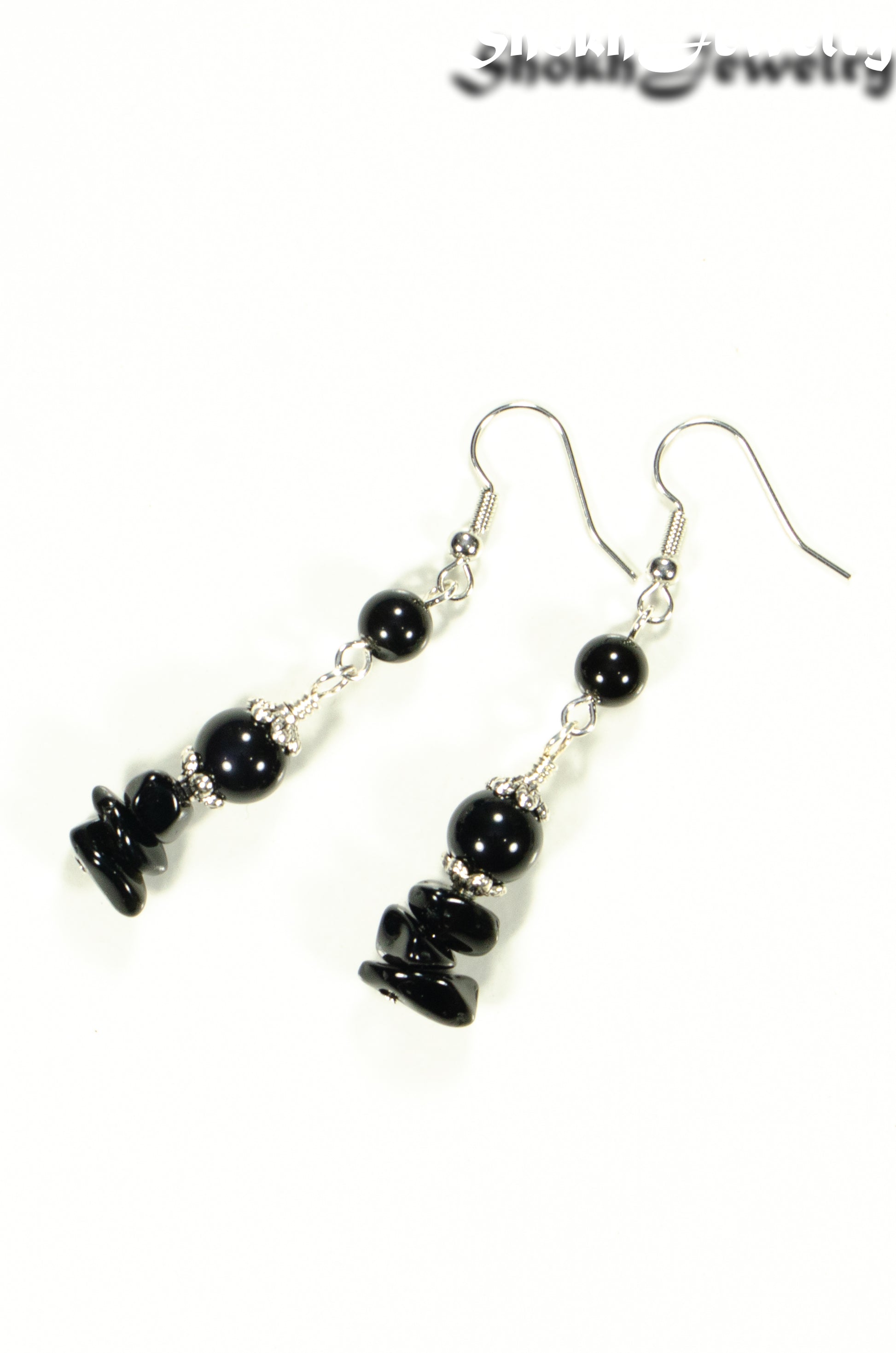 Top view of Long Black Obsidian Crystal Chip Earrings.