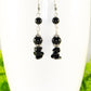 Close up of Long Black Obsidian Crystal Chip Earrings.