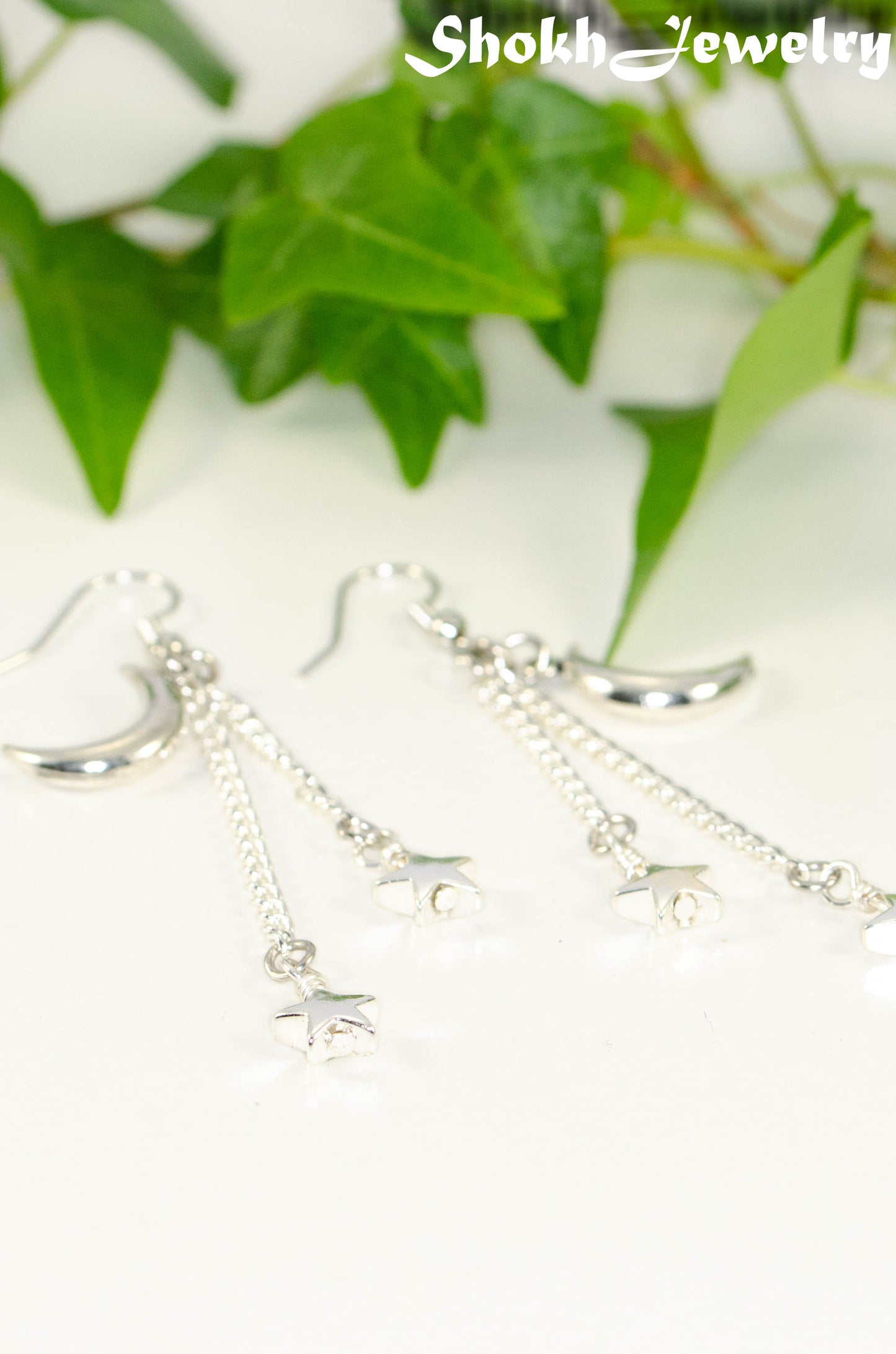 Long Crescent Moon and Hematite Star Earrings.