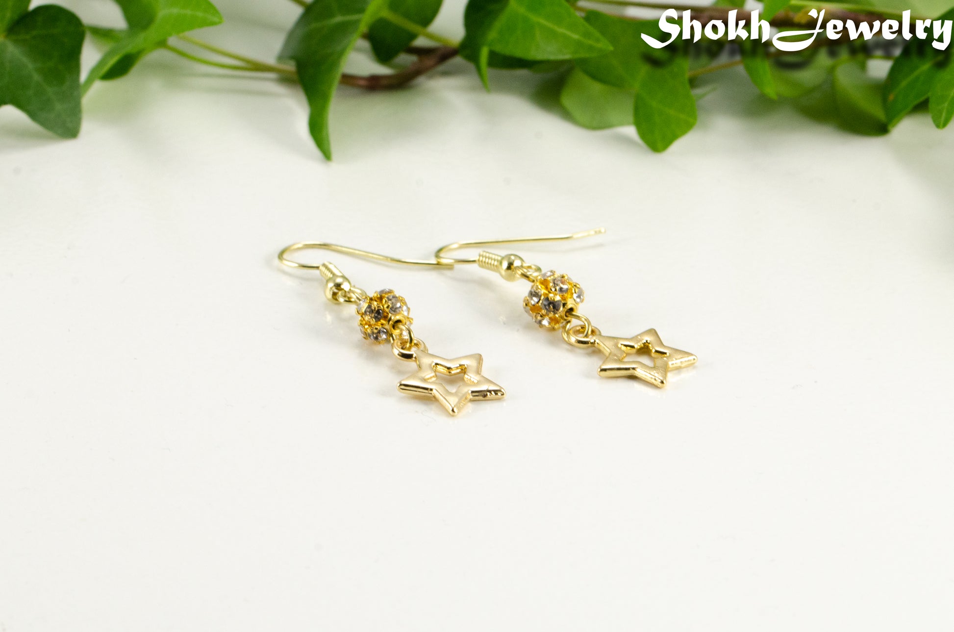 Sparkly Rhinestone and Gold Star Earrings for women.