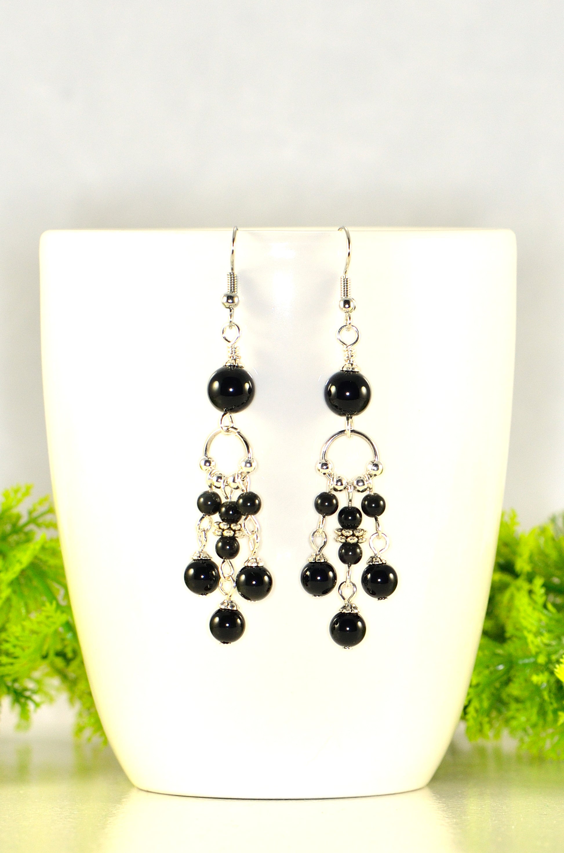 Close up of Statement Black Obsidian Chandelier Earrings.
